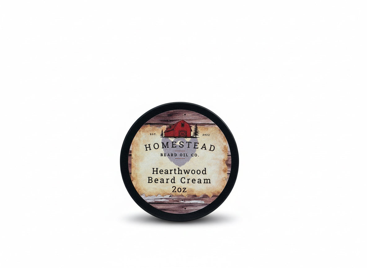 Homestead Beard Co. Hearthwood Beard Cream container on a grassy field with a cloudy sky.