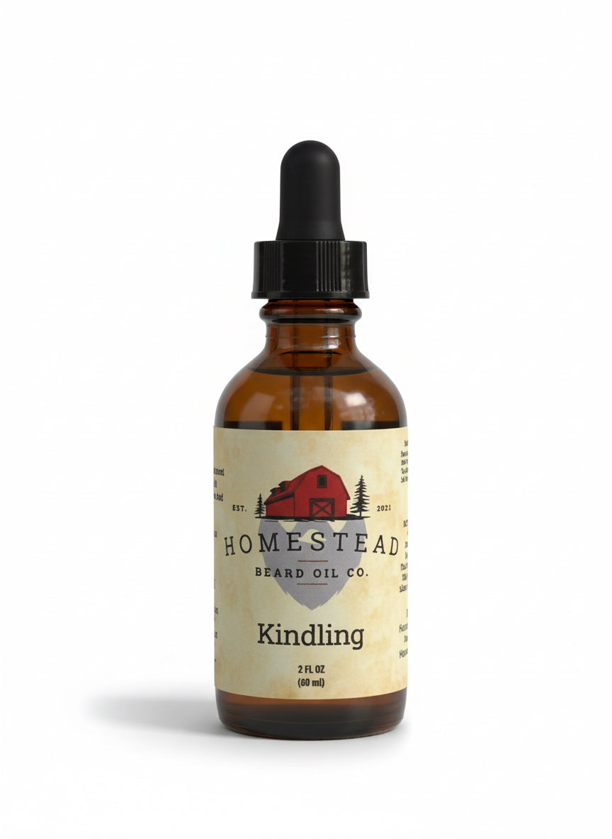 Bottle of Homestead Kindling oil with a field and blue sky in the background