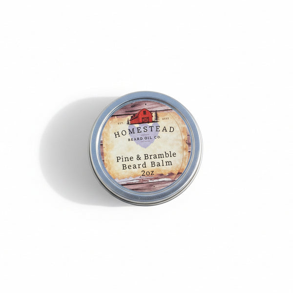 Homestead Beard Oil Co. Pine & Bramble Beard Balm container on grass