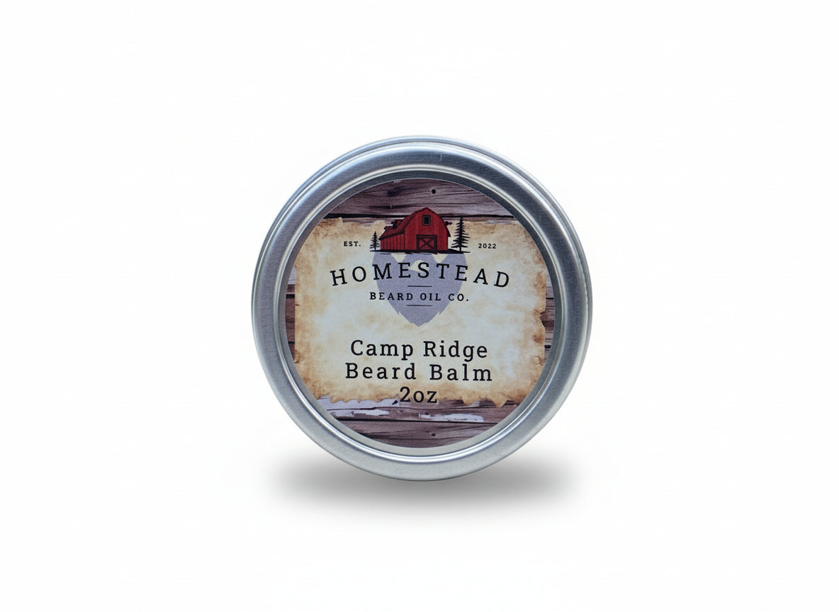 Homestead Beard Oil Co. Camp Ridge Beard Balm tin on a hay bale with a natural background