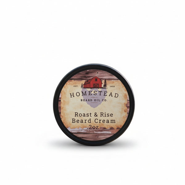 Jar of Homestead Beard Oil Co. Roast & Rise Beard Cream on grass with a blurred natural background