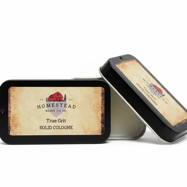 Solid cologne tins in a solid white background