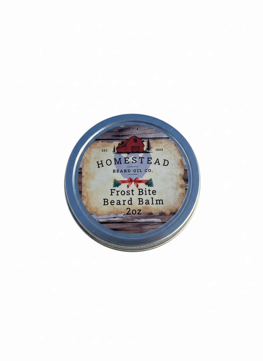 Homestead Beard Oil Co. Frost Bite Beard Balm container in the snow surrounded by peppermints
